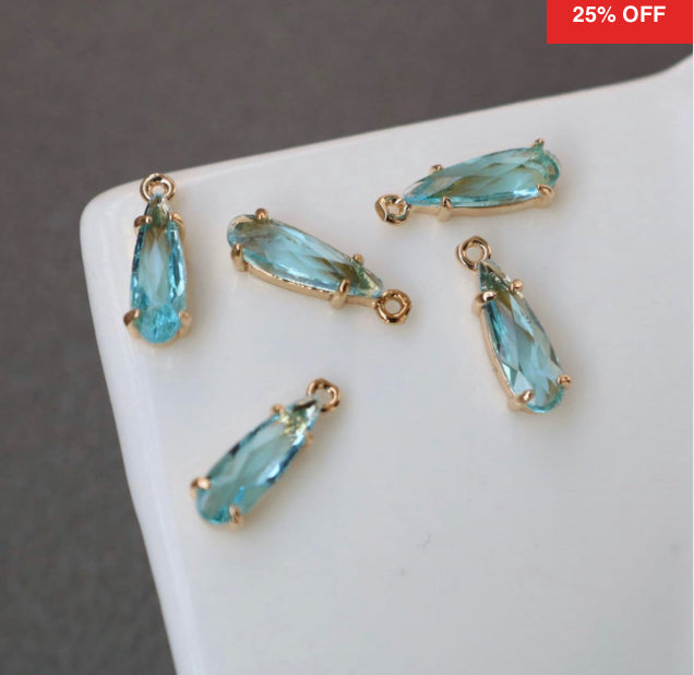 SS 425 LIGHT BLUE ZIRCON CRYSTAL GOLD PLATED PENDENT