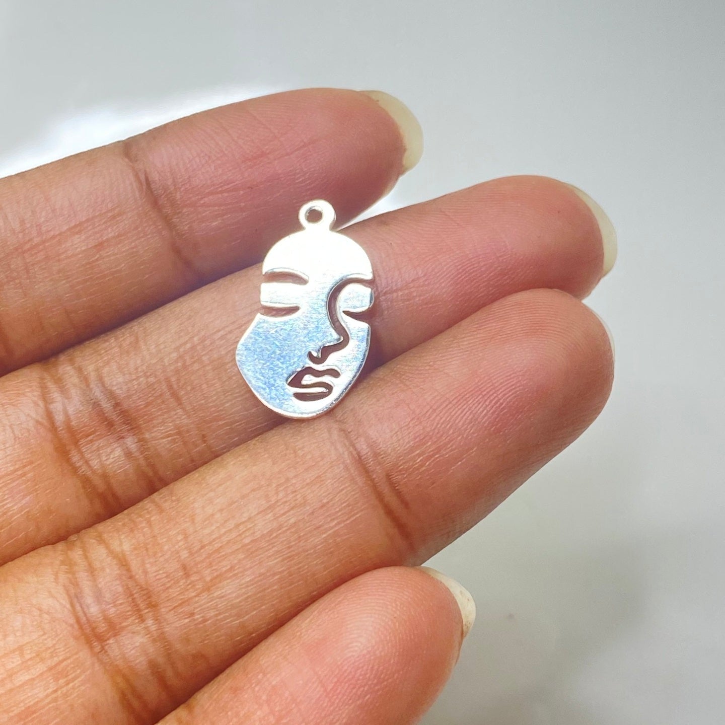 SS 297 Silver plated face charm