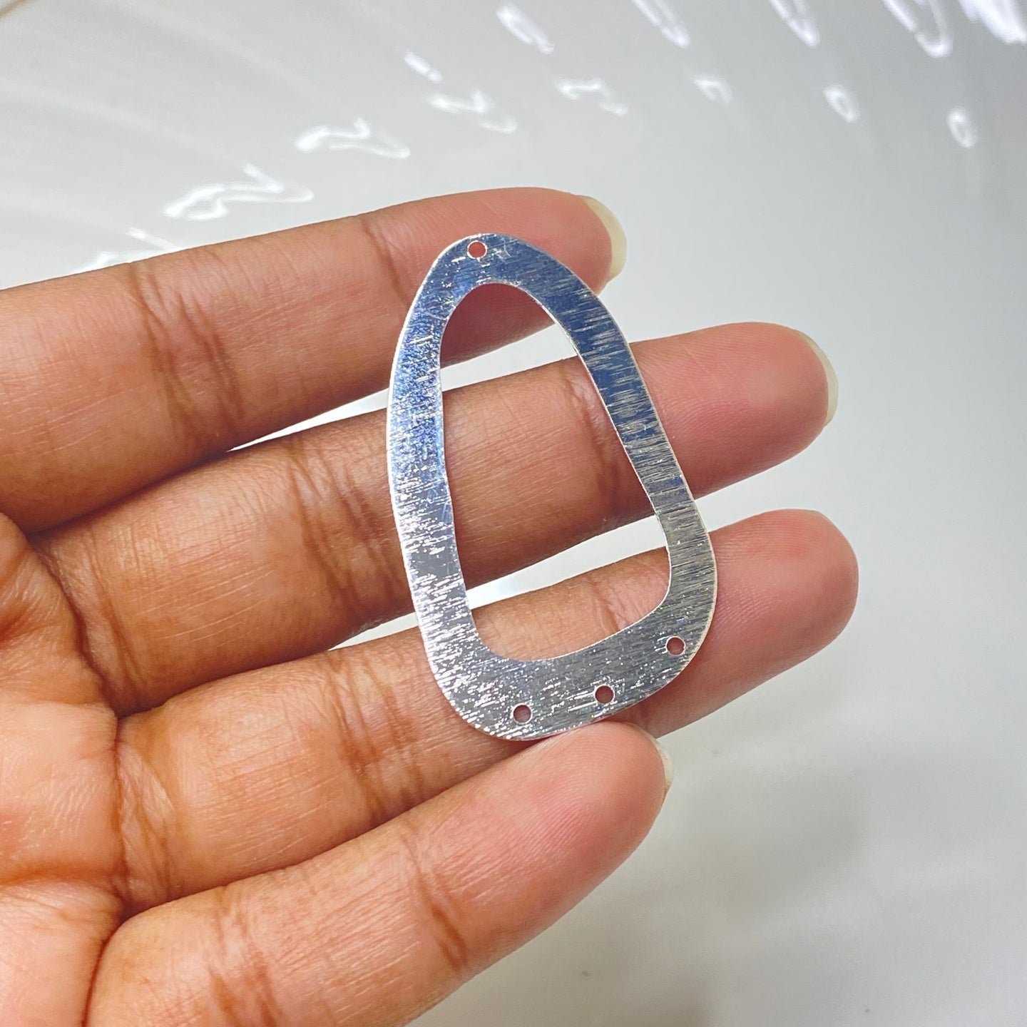 SS 294- Textured oval silver plated connector