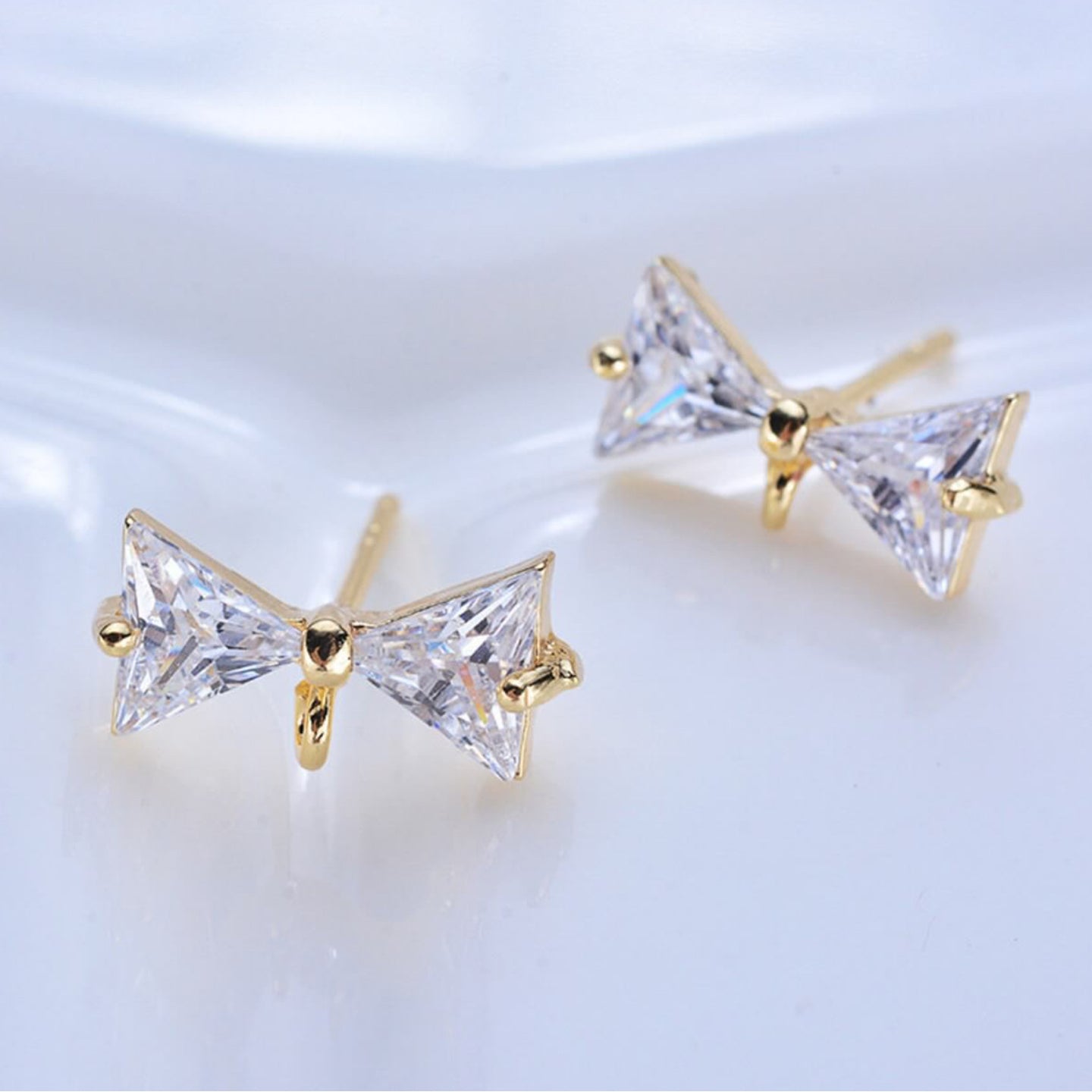 SS 872 Bow zircon crystal stud ( 2 pc ) Anti tarnish