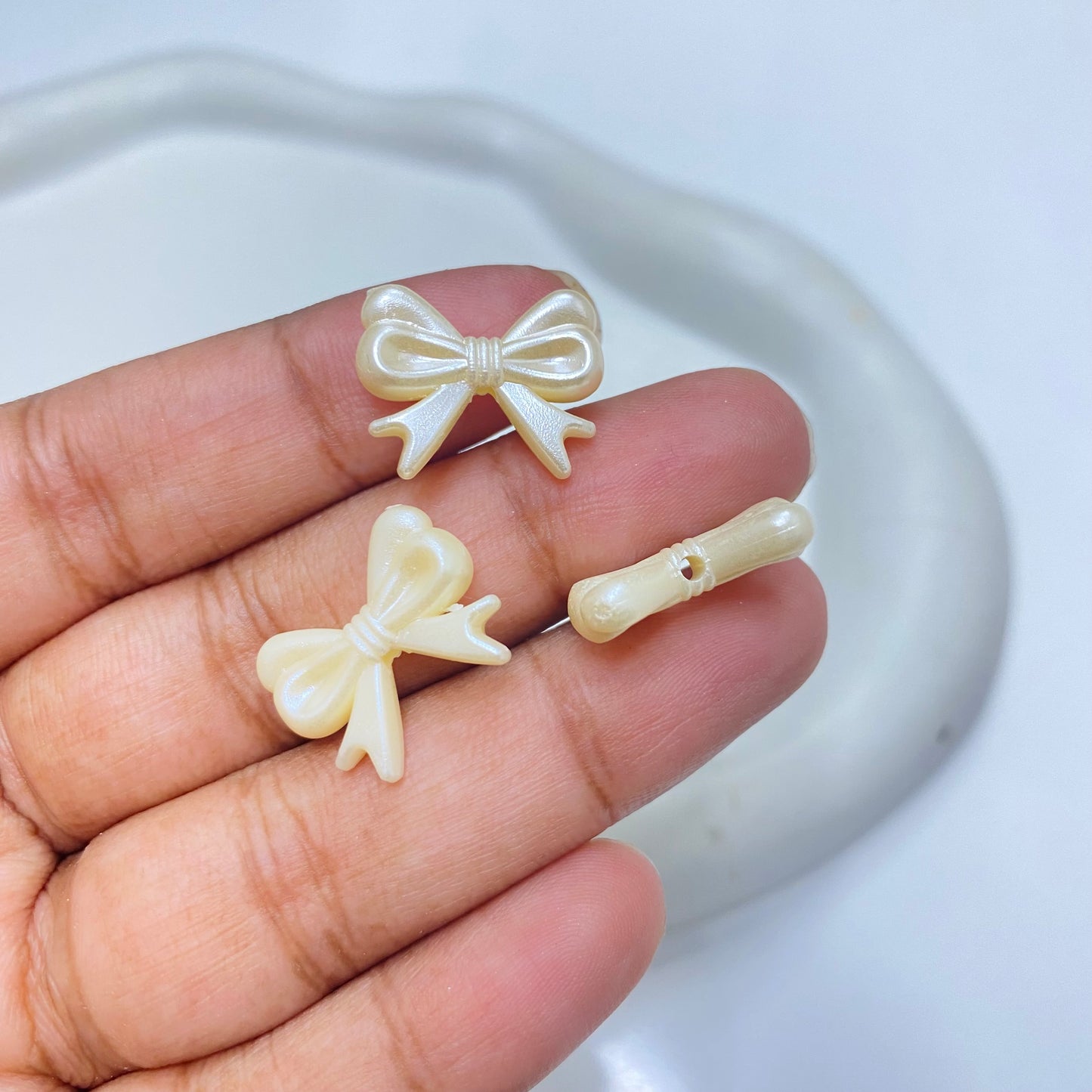 BBB 168 (C) Cream bow pearl shiny luminous Acrylic bead ( 1 pc )