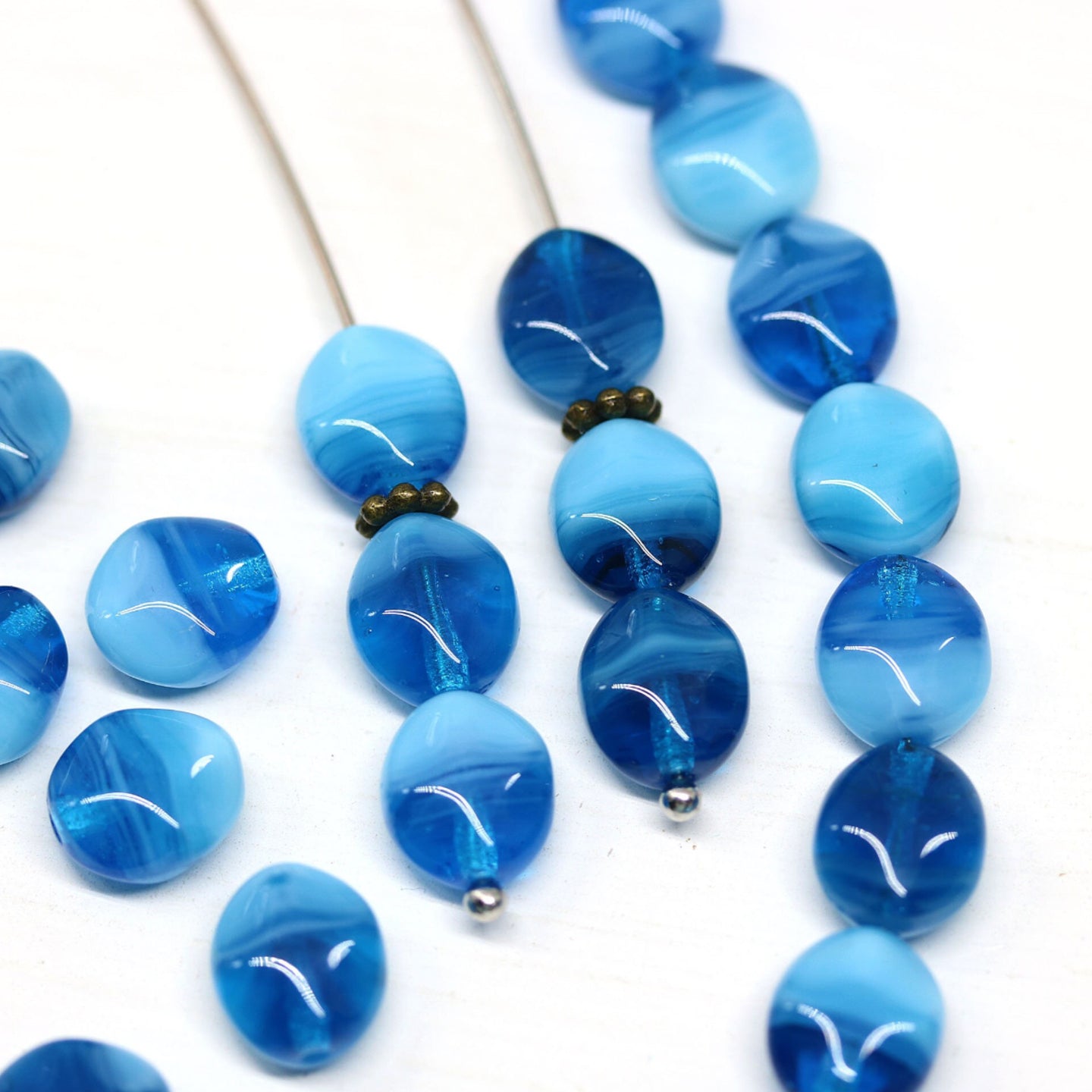 SS 257 wavy oval blue czech glass bead