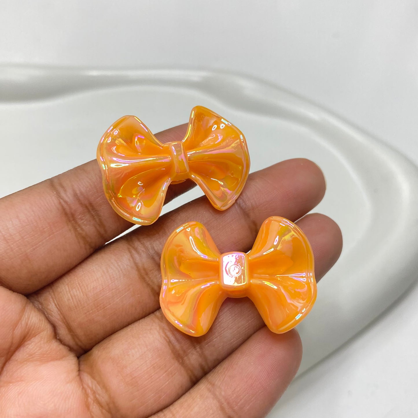 BBB 175 (F) light orange bow iridescent Acrylic bead (1PC)