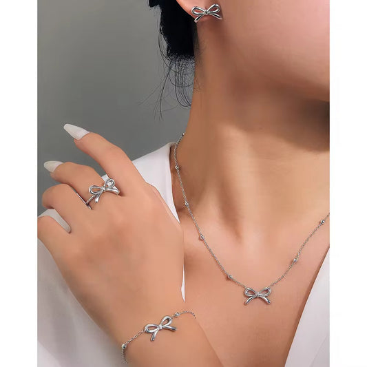 NSJ14E Modern Bow Jewelry Set - steel PVD plated 316 stainless steel - Anti tarnish