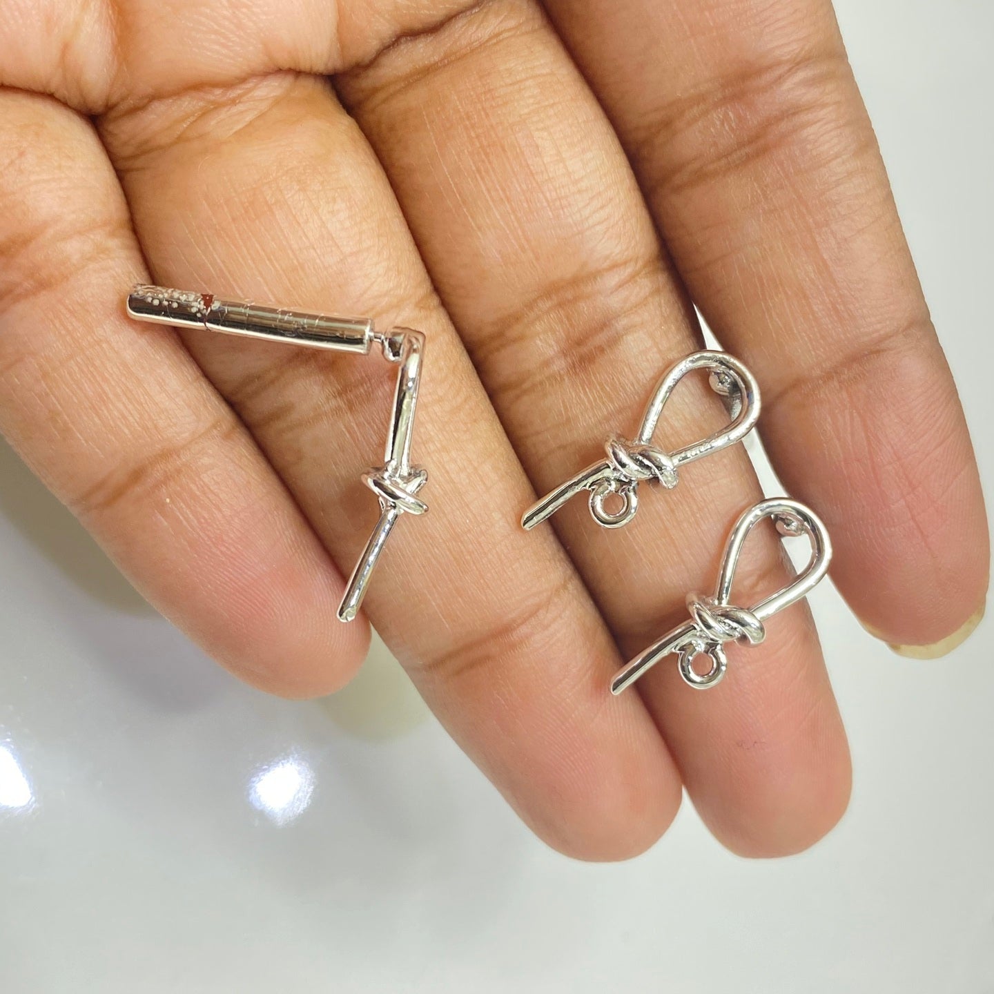 SS 234 Silver plated bow knot stud