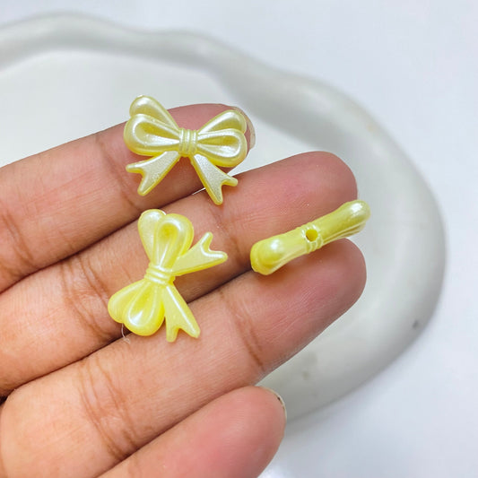 AB70 bow pearl shiny luminous Acrylic bead ( 1 pc )
