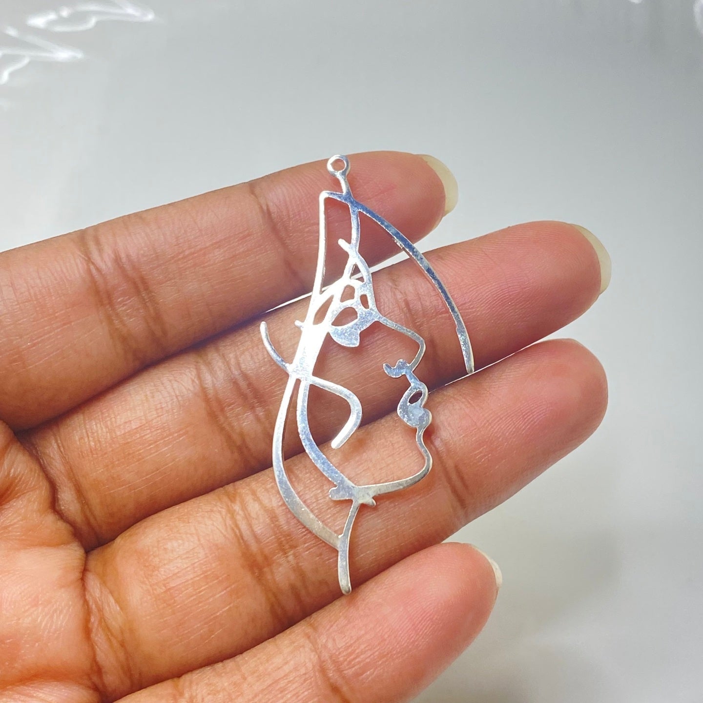 SS 301 Face shaped silver plated charm