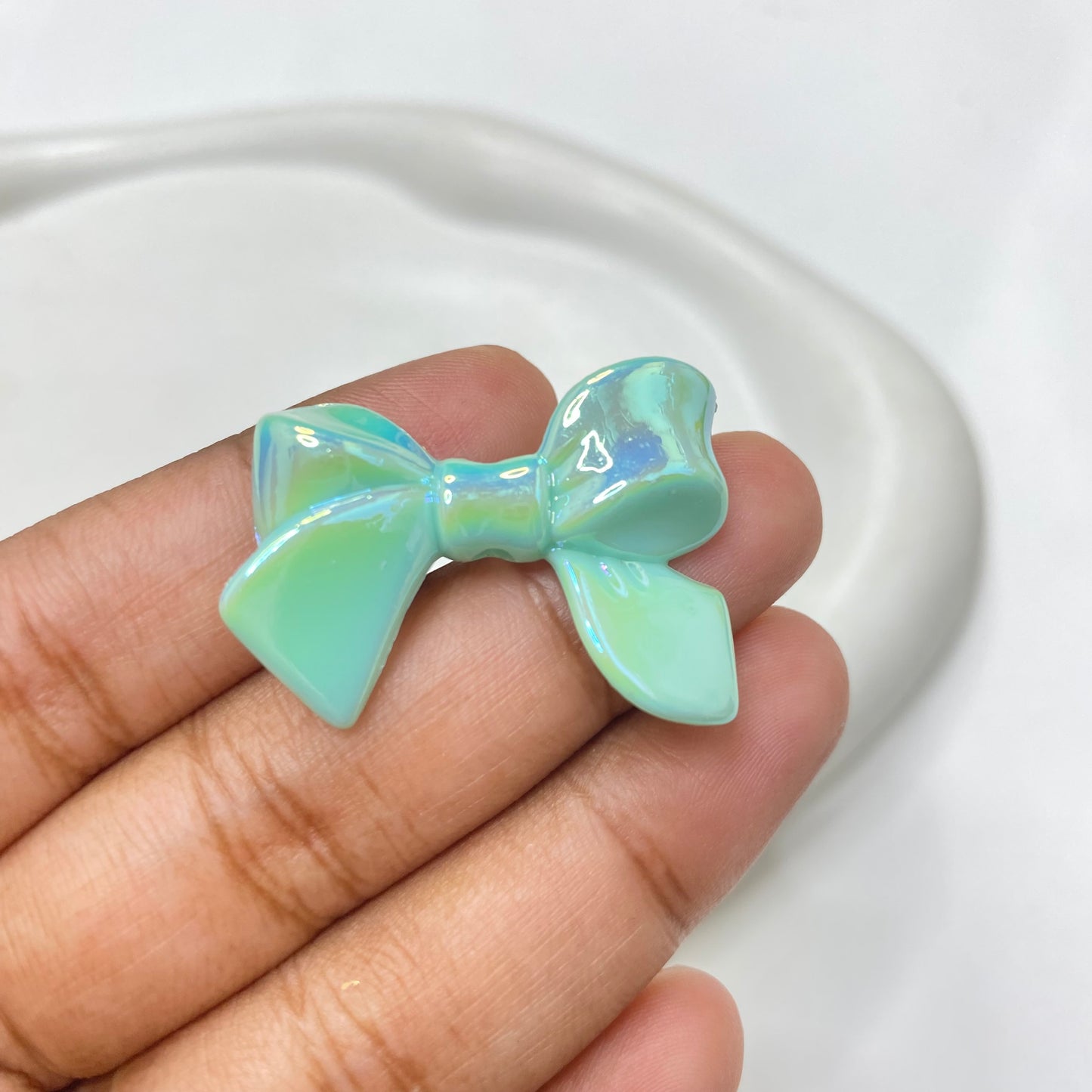 BBB 124 (D) Bow uv plated shiny irrediscent Acrylic bead (1PC)
