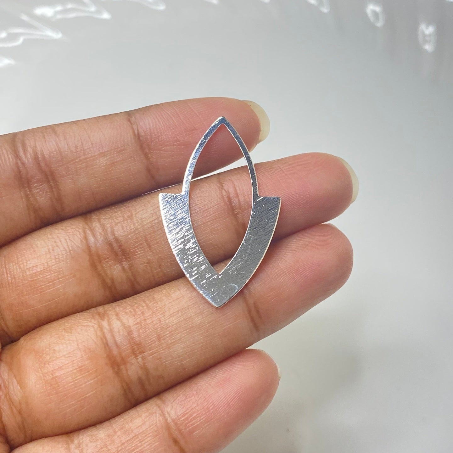 SS 269 Silver plated textured charm