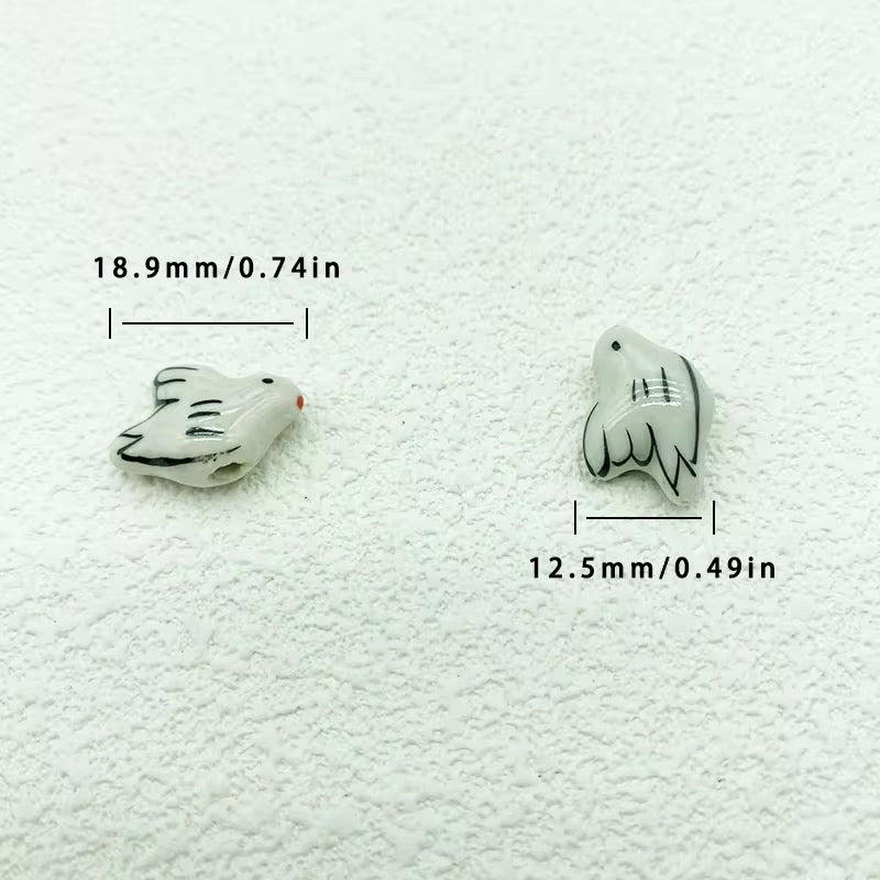 CB 932 Birdie porcelain ceramic bead ( 1 pc )
