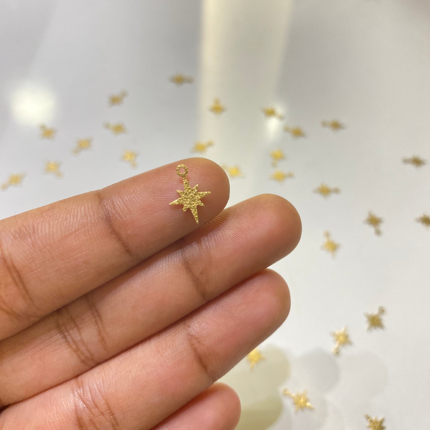 B 1059 Textured North Star charm