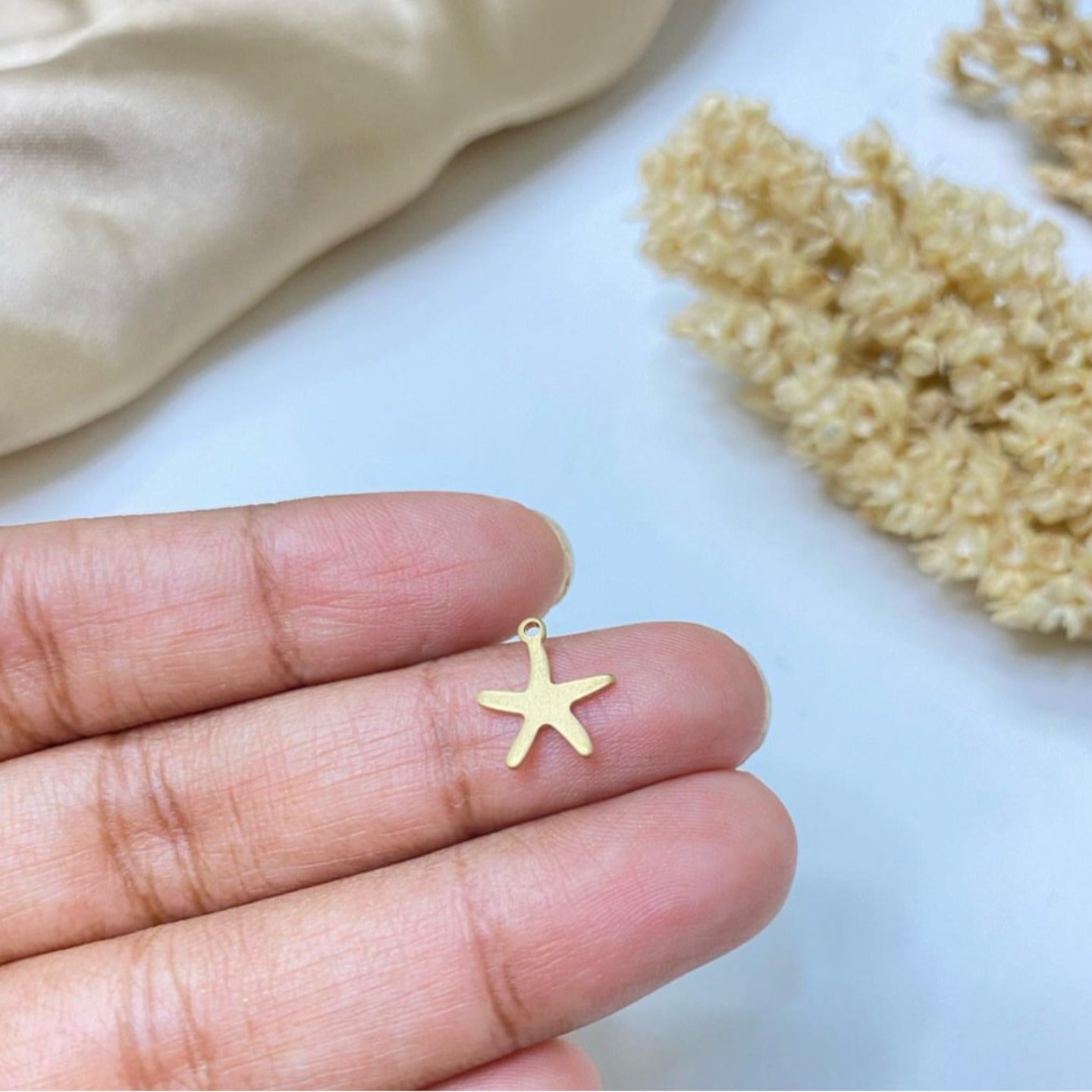 BBB 406 (d) Star fish charm ( 1 pc ) Raw brass