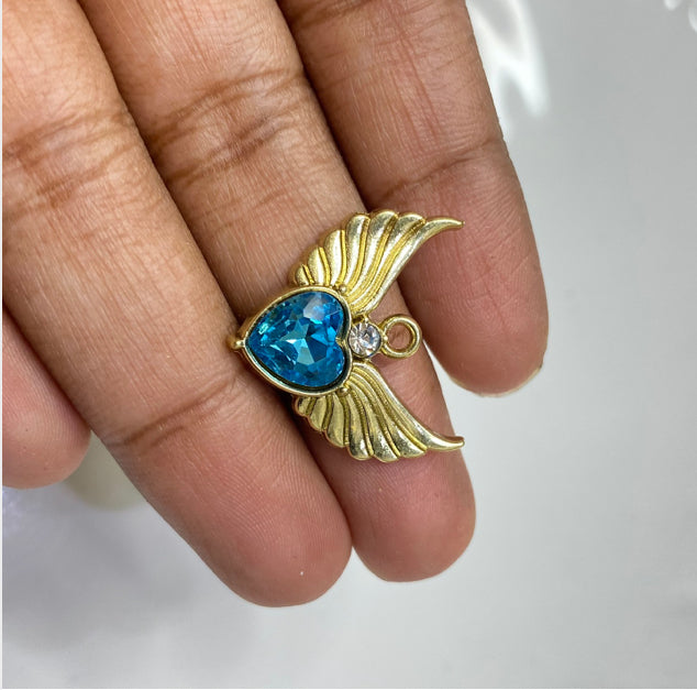 SS 437 SEA BLUEholographic heart with wings gold plated charm