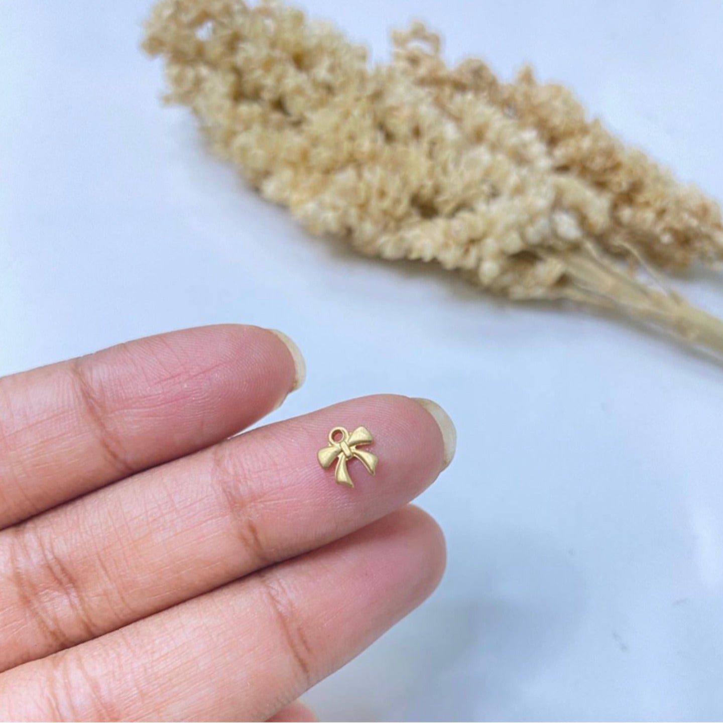 SS 153 tiny bow charm ( 1 pc )