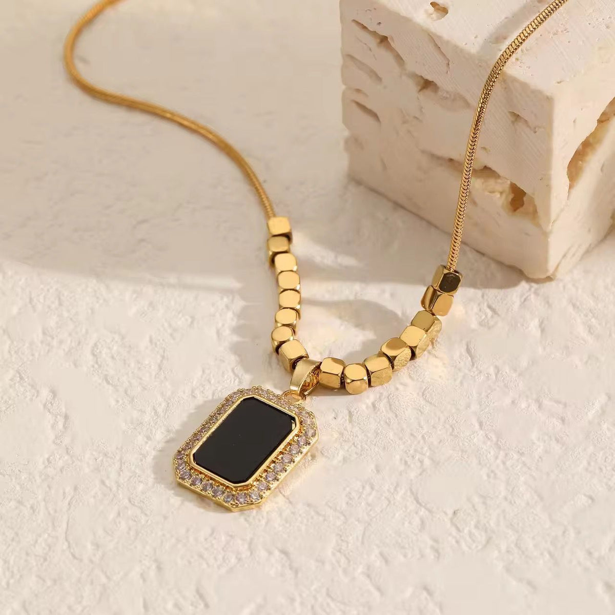 NSJ42B Noir Royale Pendant Necklace 18k gold PVD plated