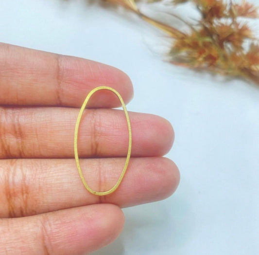 BC02E oval charm ( 1 pc ) Raw brass