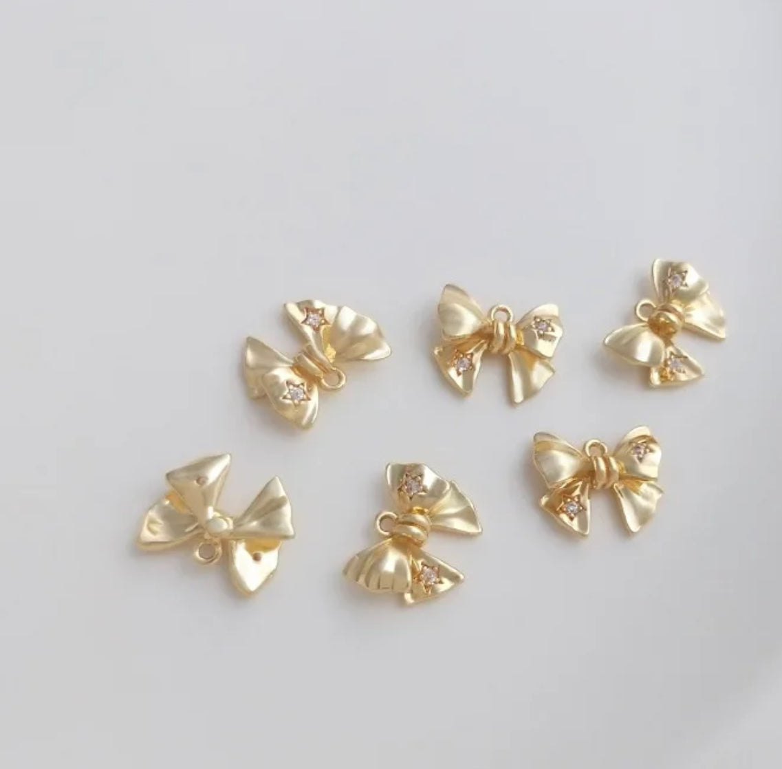 GP 1453 - Star Zircon bow 14k gold plated charm - per piece - anti tarnish