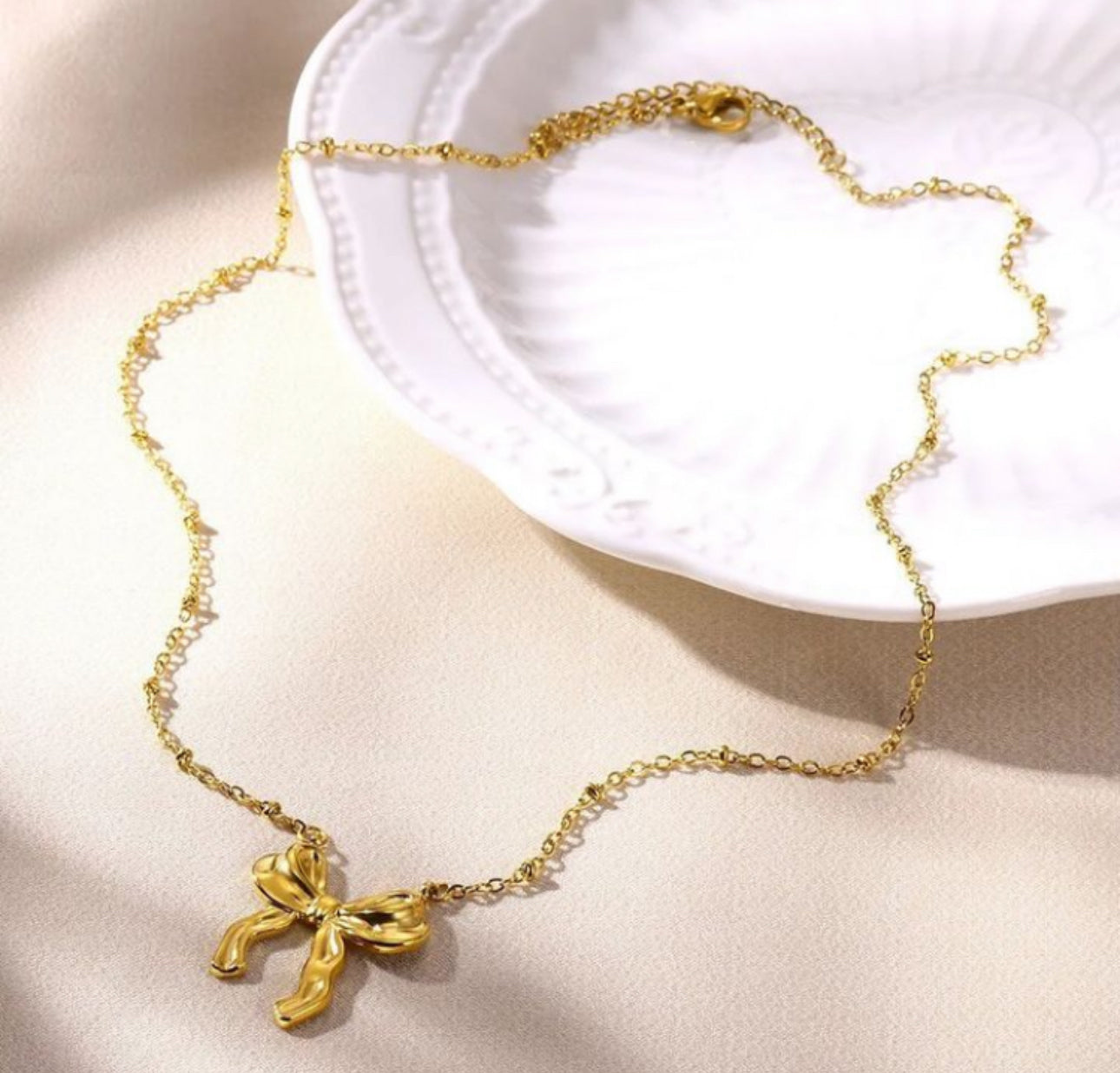 SS 74 Classic Ribbon Bow Necklace - 18k stainless steel - Anti tarnish - Wholesale