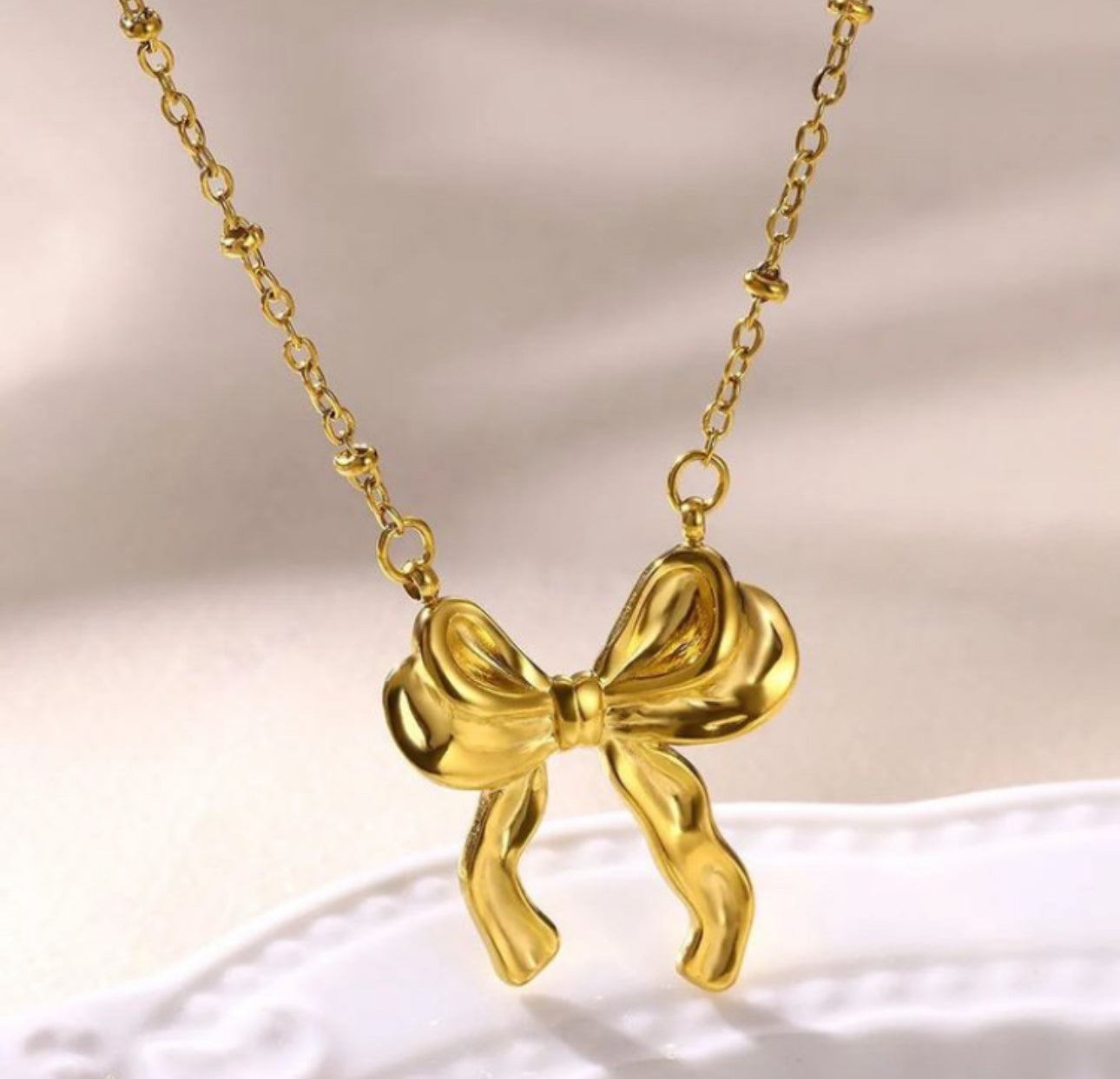 SS 74 Classic Ribbon Bow Necklace - 18k stainless steel - Anti tarnish - Wholesale