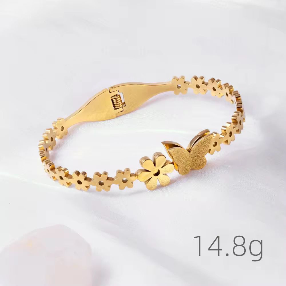 SJ 474 - butterfly daisy cutf bracelet -18k Gold PVD plated stainless steel - Anti tarnish