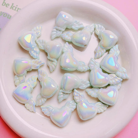 BBB 160 (F) Luminous heart with wings uv plated holographic irrediscent Acrylic bead ( 1 pc )