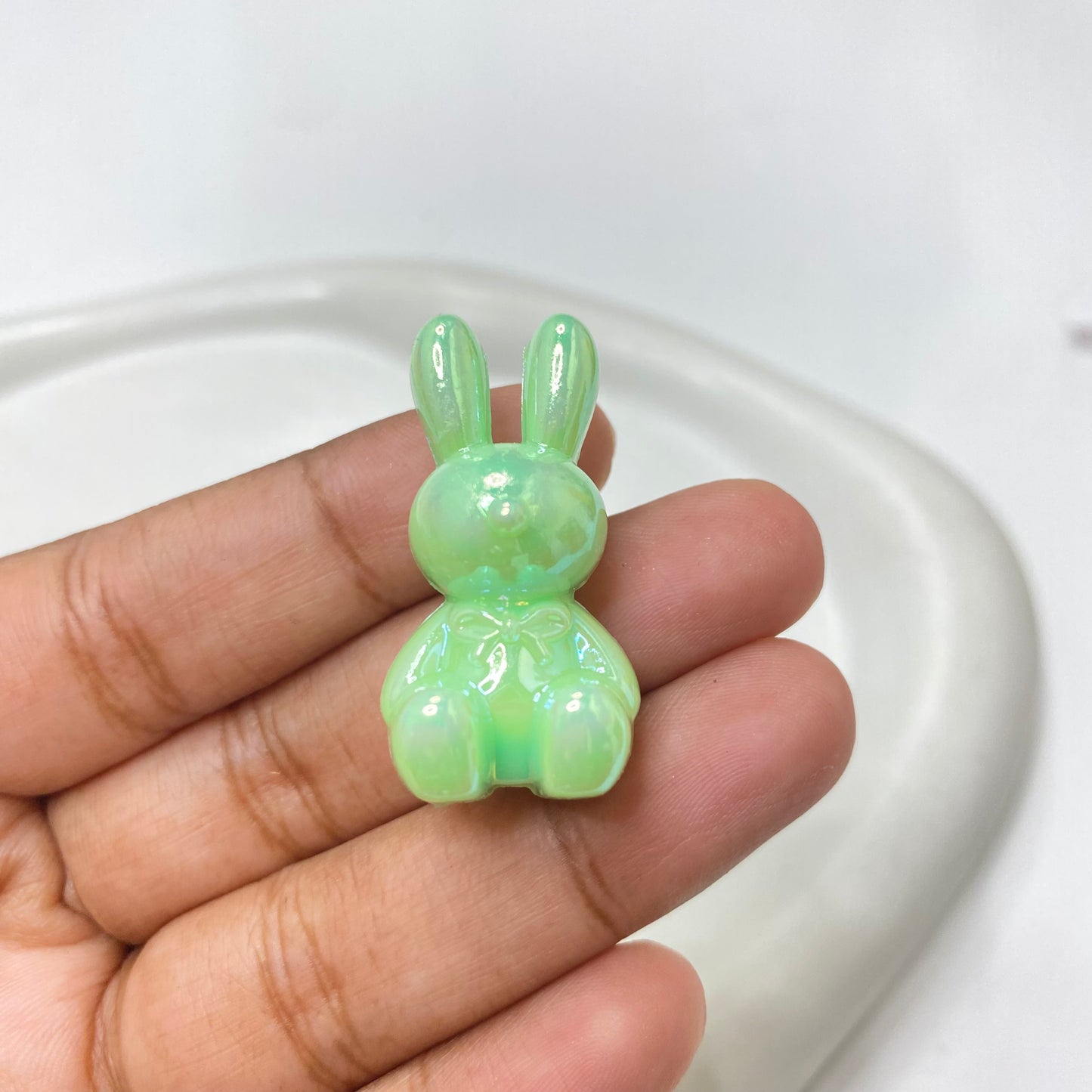AC 1499 Rabbit uv plated shiny irrediscent Acrylic bead- per piece