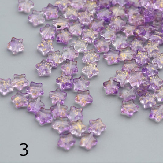 BBB 105 (F)  Dark purple star glass bead ( 1 pc )