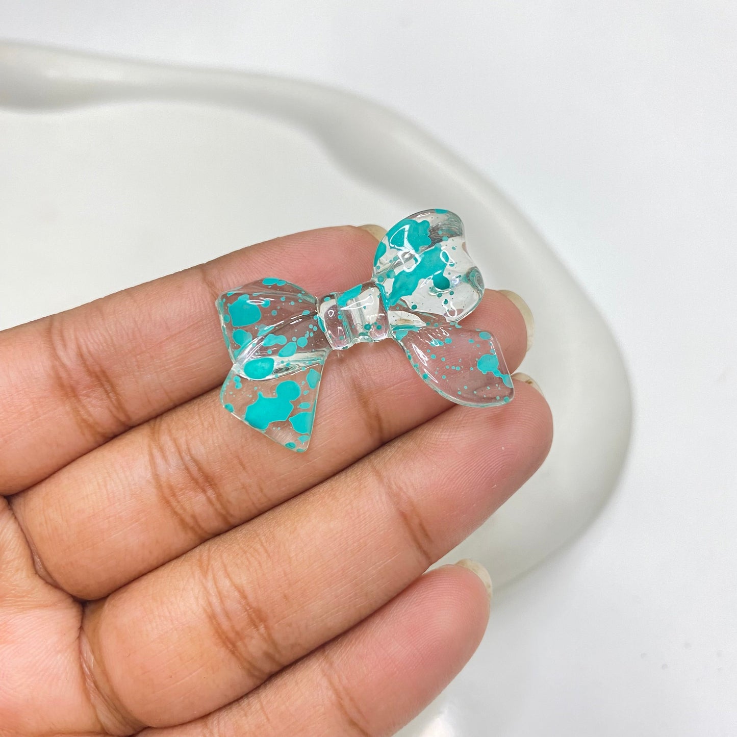 AB37 Bow colour splashed uv plated Acrylic bead ( 1 pc )