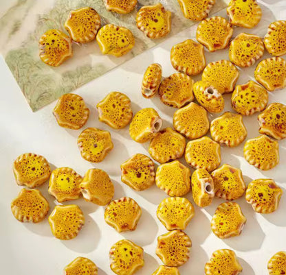 BBB 214 (g) Mustard Yellow Shell Porcelian Ceramic bead ( 1 pc ) High Shine ( 12:10 mm )
