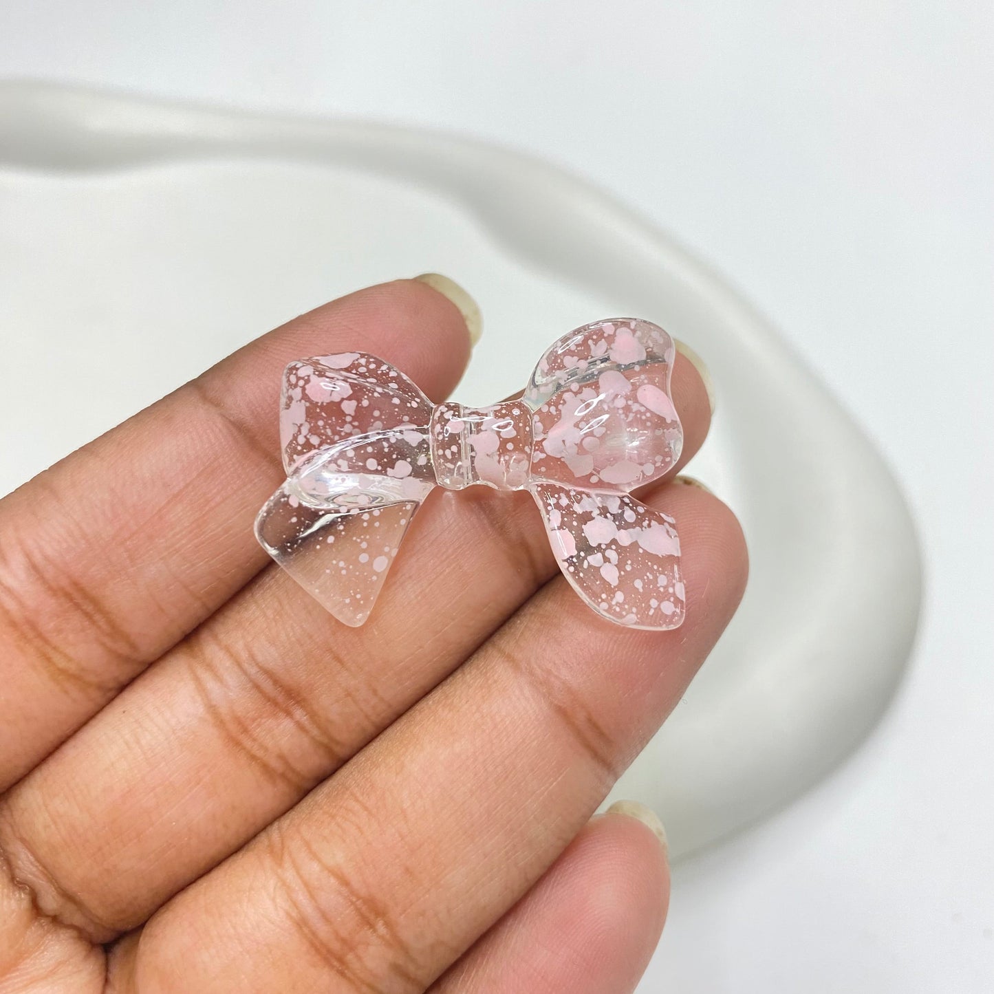 AB37 Bow colour splashed uv plated Acrylic bead ( 1 pc )