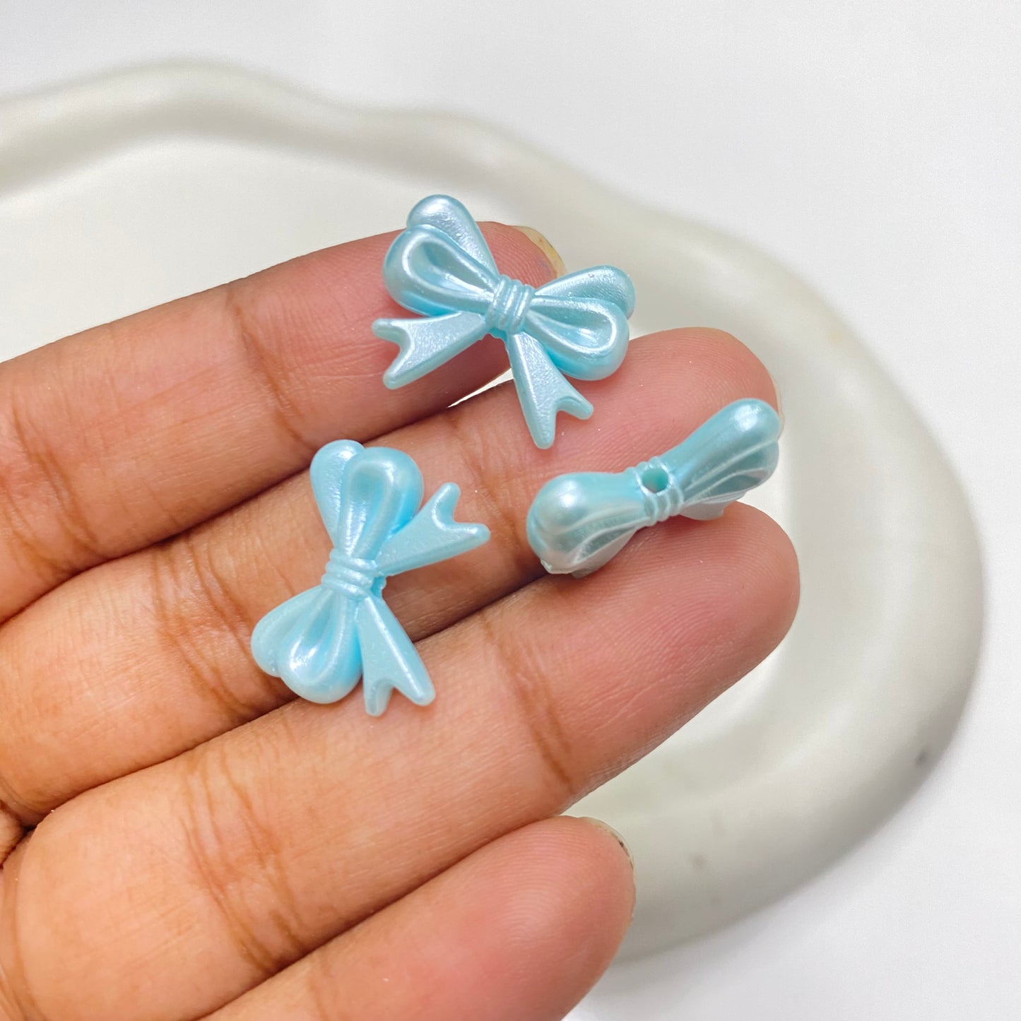BBB 168 (E)  light blue bow pearl shiny luminous Acrylic bead ( 1 pc )