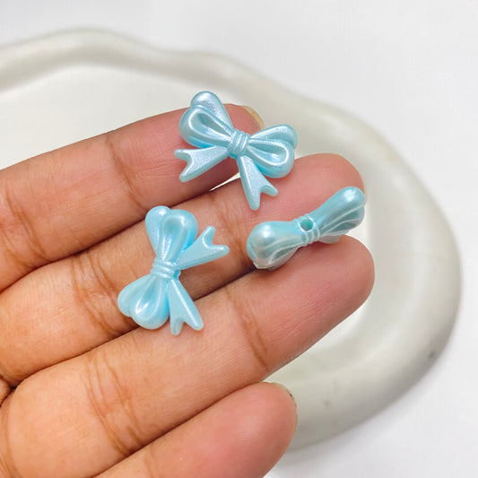 BBB 168 (E)  light blue bow pearl shiny luminous Acrylic bead ( 1 pc )