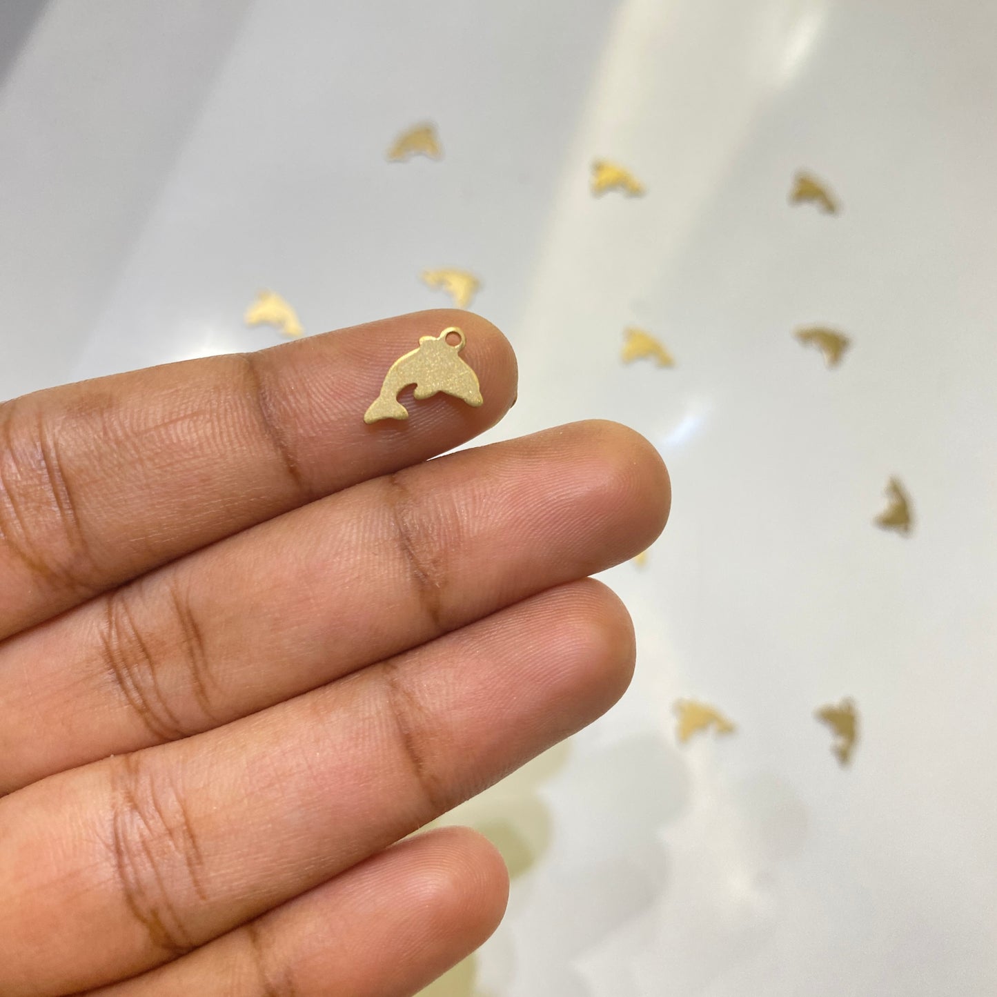 SS 1060 dolphin charm