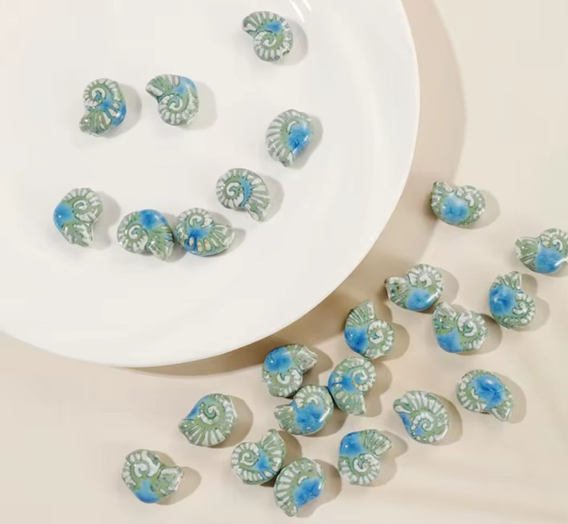 BBB 215 (b) Bluish Green Conch Shell Porcelian Ceramic bead ( 1 pc ) High Shine ( 21:16 mm )