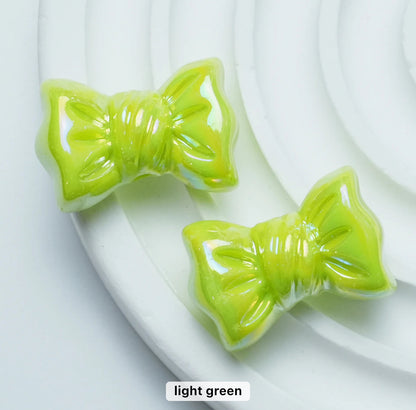 AB39 Candy bow shiny irrediscent Acrylic bead (1PC)