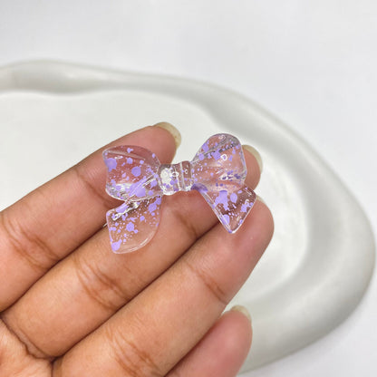AB37 Bow colour splashed uv plated Acrylic bead ( 1 pc )