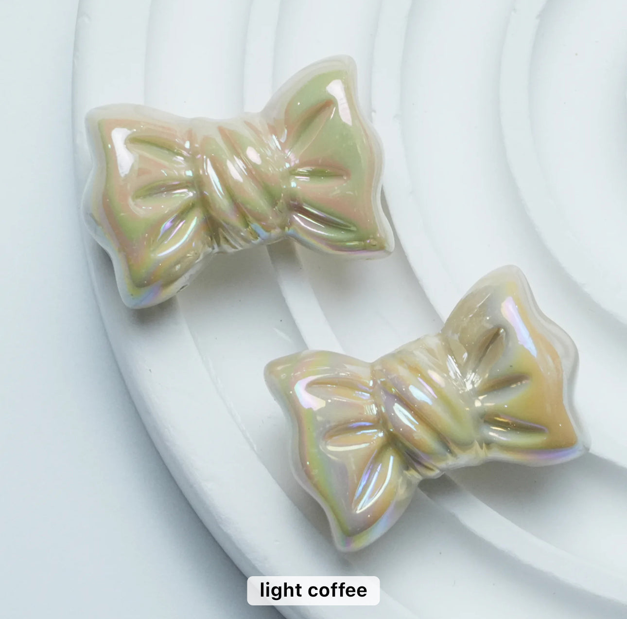 AB39 Candy bow shiny irrediscent Acrylic bead (1PC)