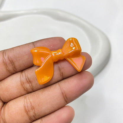 BBB 124 (J) Bow uv plated shiny irrediscent Acrylic bead (1PC)