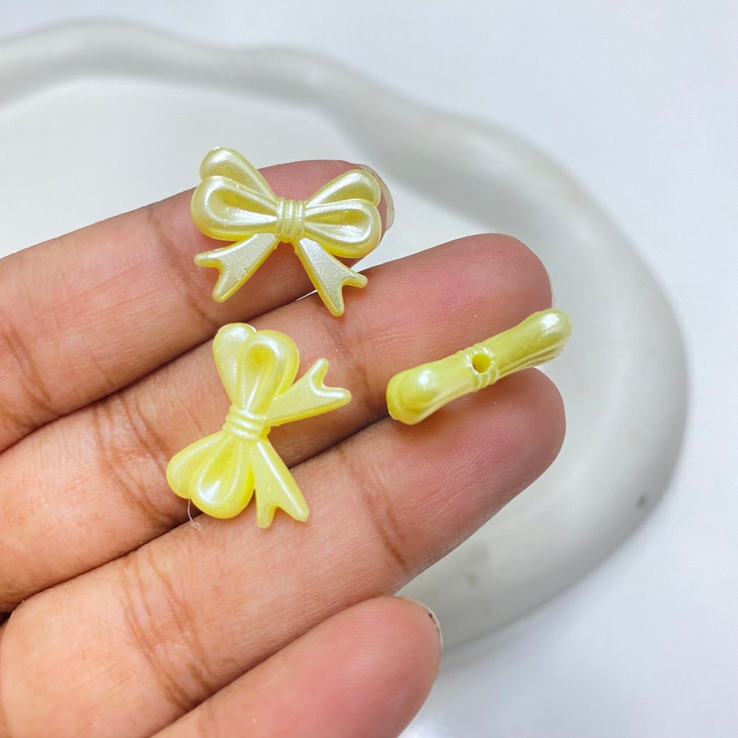 BBB 168 (F) yellow bow pearl shiny luminous Acrylic bead ( 1 pc )