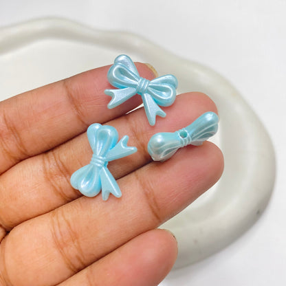 AB70 bow pearl shiny luminous Acrylic bead ( 1 pc )