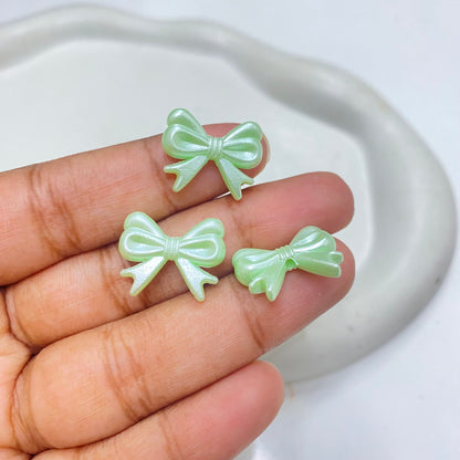 AB70 bow pearl shiny luminous Acrylic bead ( 1 pc )