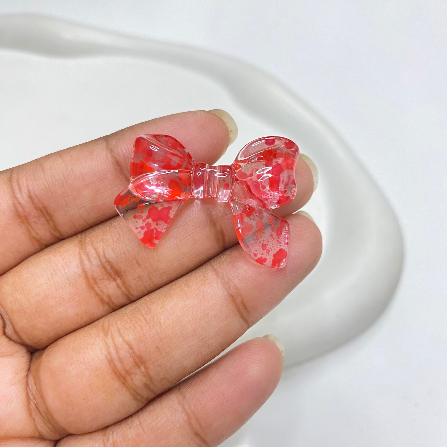 AB37 Bow colour splashed uv plated Acrylic bead ( 1 pc )