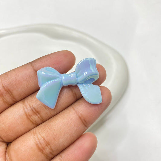 BBB 124 (I)  Bow uv plated shiny irrediscent Acrylic bead (1PC)