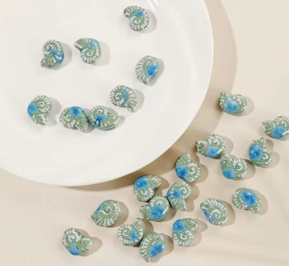 PCB15 Conch Shell Porcelian Ceramic bead ( 1 pc ) High Shine ( 21:16 mm )