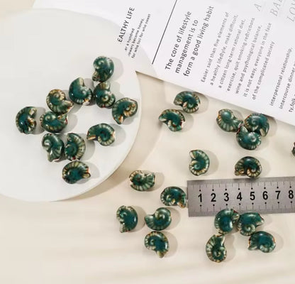 PCB15 Conch Shell Porcelian Ceramic bead ( 1 pc ) High Shine ( 21:16 mm )