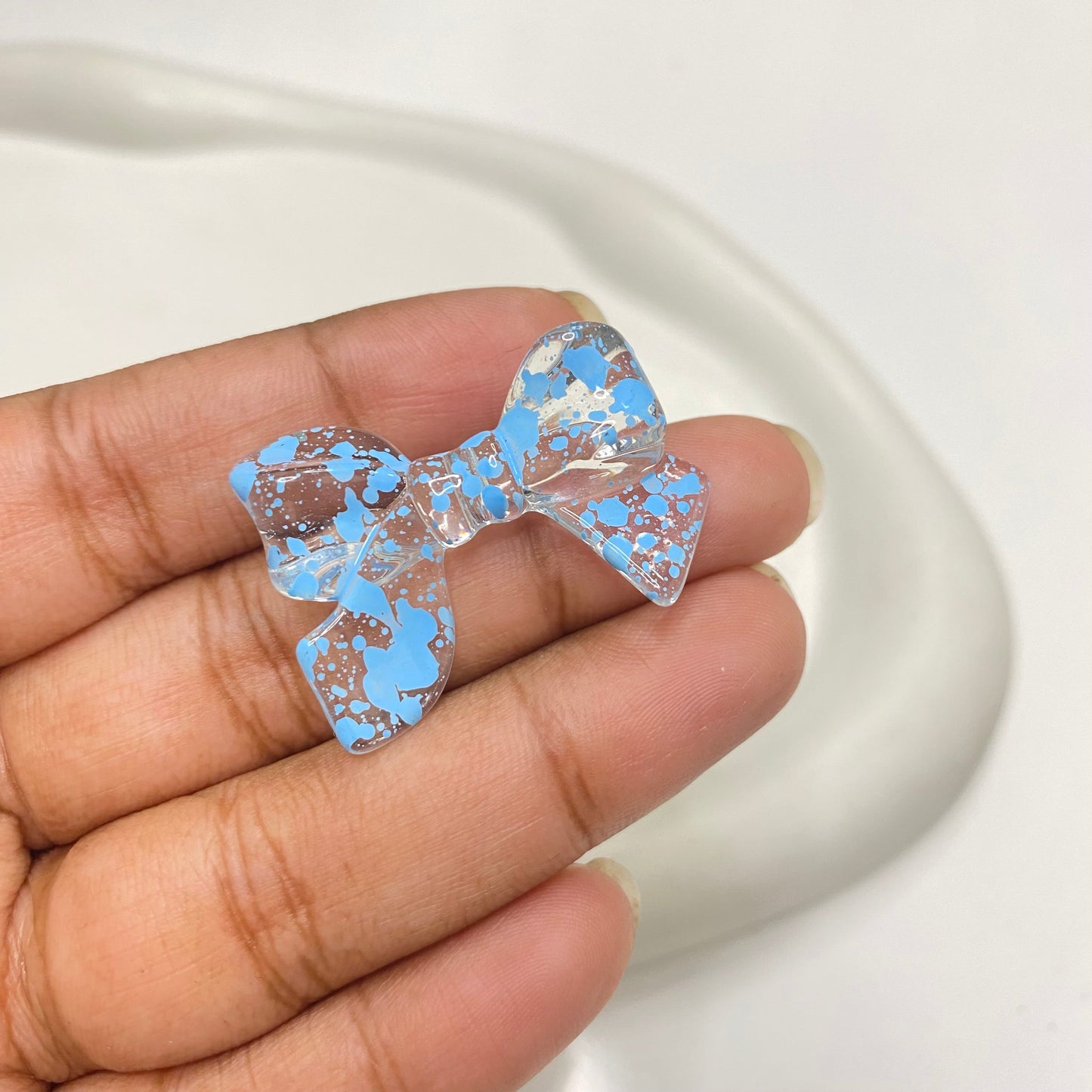 AB37 Bow colour splashed uv plated Acrylic bead ( 1 pc )