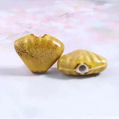 BBB 216 (f) Mustard Yellow Fan Shell Porcelian Ceramic bead ( 1 pc ) High Shine ( 18:23 mm )