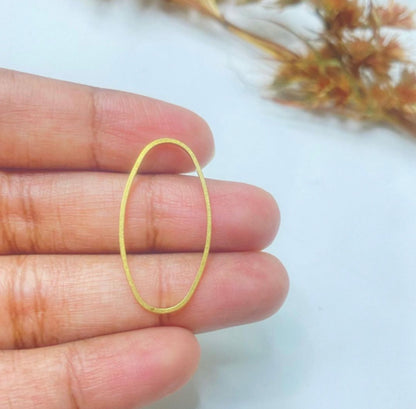 BC02E oval charm ( 1 pc ) Raw brass