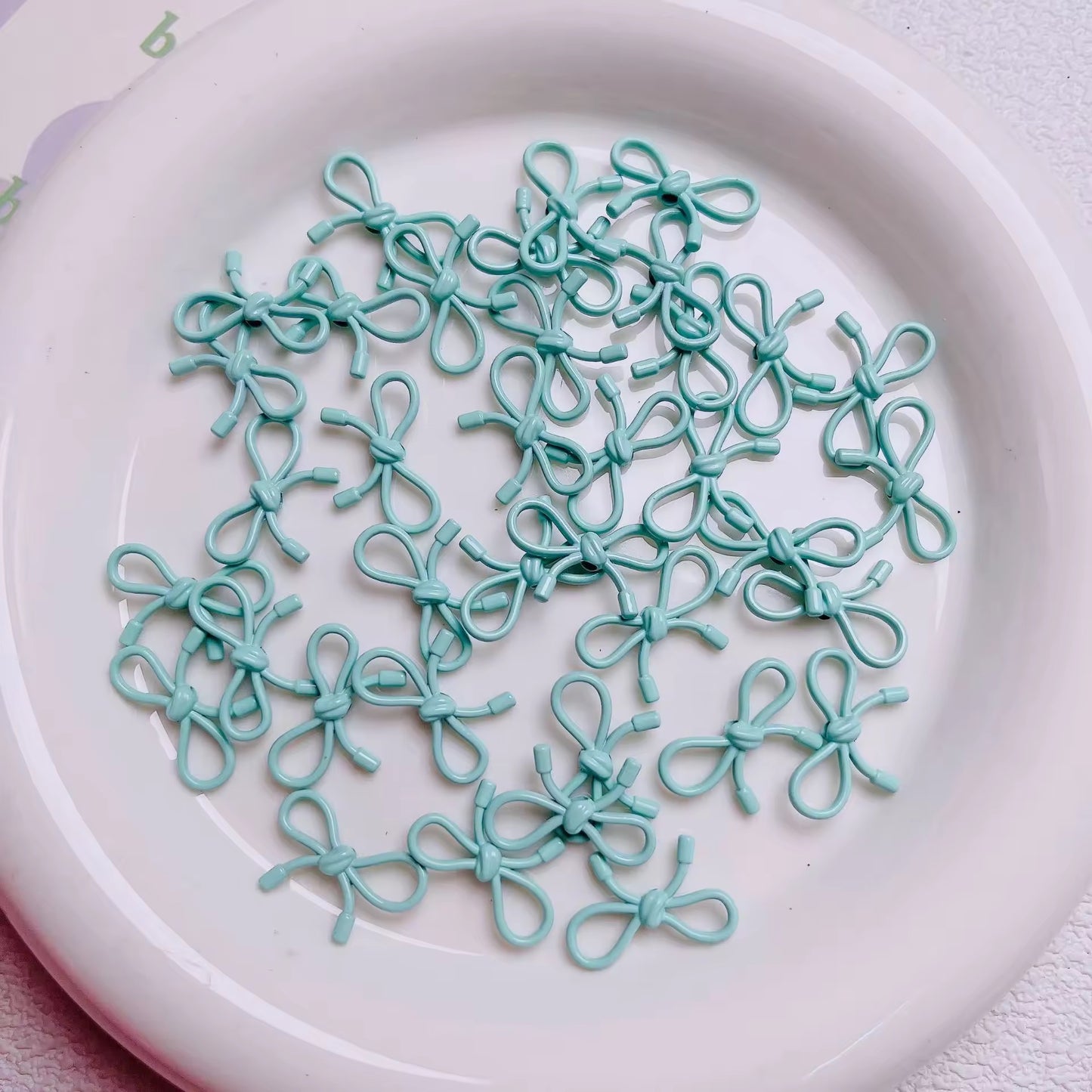BBB 046 ( F ) Light blue Butterfly knot vertical hole bead ( 1 pc )