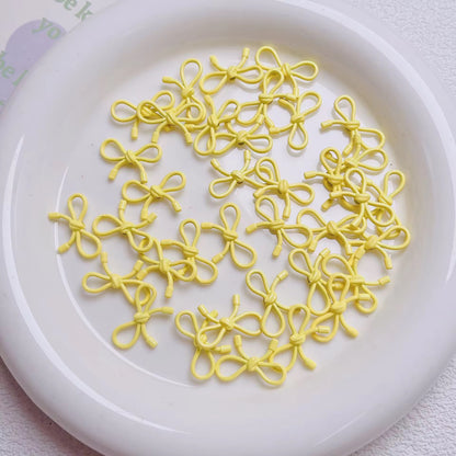 BBB 046 ( G ) Yellow Butterfly knot vertical hole bead ( 1 pc )